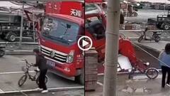 Video: खिसकते-खिसकते जमीन में समा गया भारी भरकम ट्रक, सामने आया हादसे का वीडियो