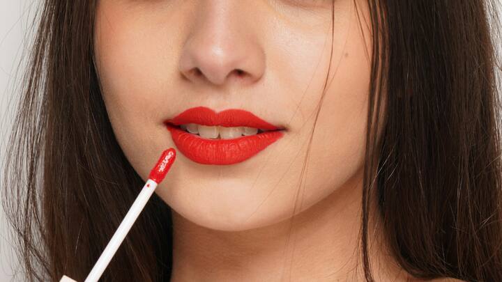Classic Matte Red: Eternal and dramatic, matte red lipstick is a festive classic. It's dramatic and yet flattering on everyone, so it's a trusty option for classic and contemporary festive fashion. (Image Source: Canva)
