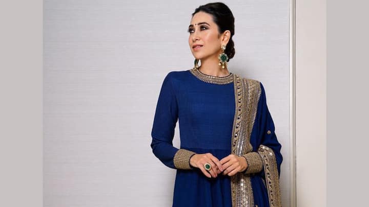 Karisma looked graceful in this royal blue anarkali with embellished borders. She paired it with a heavy dupatta and statement earrings. (Image Source: Instagram/ therealkarismakapoor)