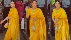 येलो साड़ी...बालों में गजरा, एयरपोर्ट पर दिखा करिश्मा कपूर का खूबसूरत अवतार, तस्वीरें वायरल