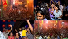 ঠাকুর দেখতে রেনকোট পরে রাস্তায় নামল মানুষ, কোথাও বন্ধ হল মণ্ডপ! বৃষ্টিতে কলকাতার ছবিটা ঠিক কেমন?