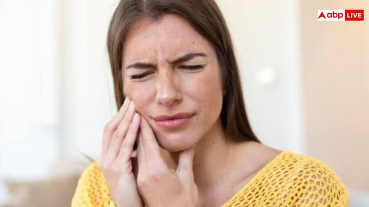 Home Remedies for Toothache: घर में उपलब्ध आसान और असरदार घरेलू उपाय, जो दांत दर्द को जल्दी कम करते हैं.