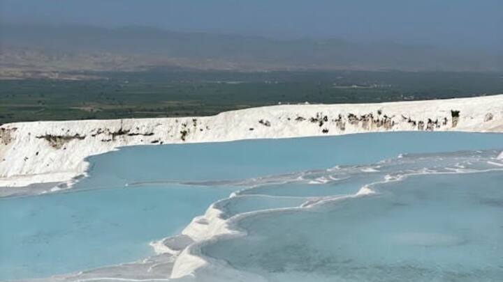 In Turkas, these mountains are made of mineral called travartine. Pamukkale is located in Denizali province of Türkiye and the region has been known as a thermal spa for thousands of years. Hot water waterfalls coming out of here are rich in minerals.