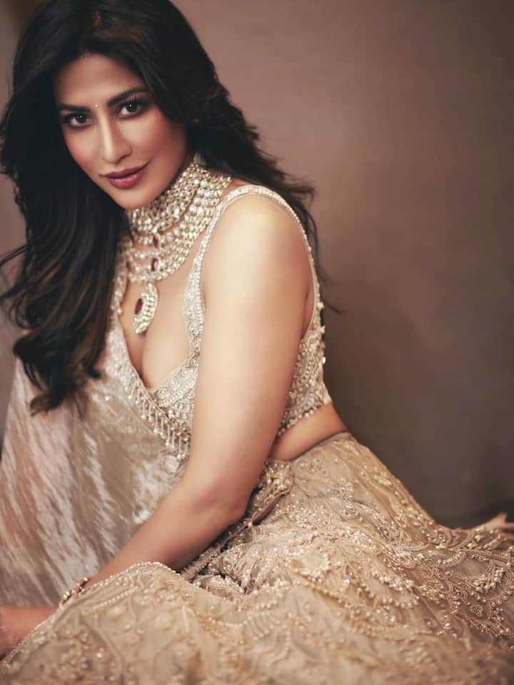 Chitrangda Singh, known for her timeless beauty and impeccable style, turned heads in a breathtaking champagne-hued lehenga that radiated sheer sophistication and regal charm.