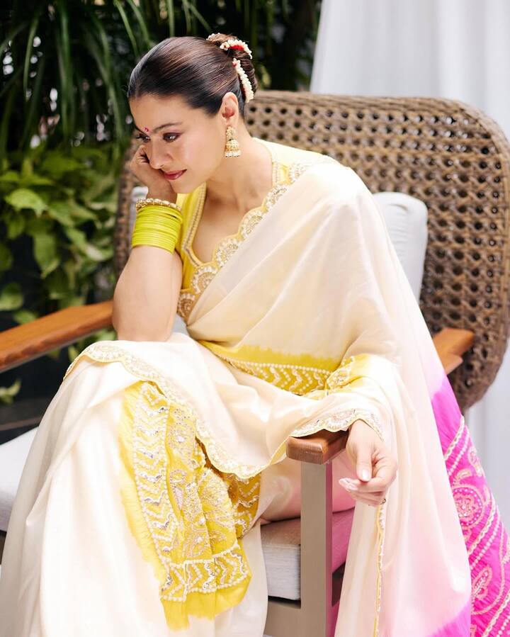 She styled the look with a contrasting yellow blouse, keeping the focus on the saree’s colorful detailing. Kajol accessorized minimally yet elegantly—a pair of statement jhumkas and traditional bangles elevated her outfit without overpowering it.