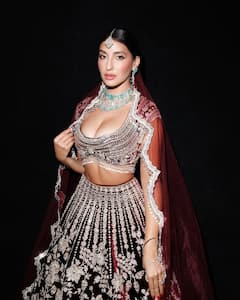 मैरून लंहगे में दुल्हन सी सजीं नोरा फतेही, कातिल अदाओं ने चुराया फैंस का दिल, फैंस बोले - ‘इतनी सुंदर क्यों हो..’