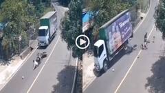 Video: किस्मत थी, जो बच गए! फिसलकर बाइक ट्रक से टकराई, कुचलने से बचे 2 लोग, वीडियो वायरल