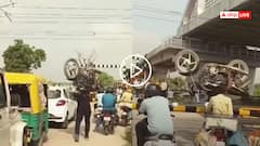 Video: क्रॉसिंग पर बाहुबली! बंद हुआ फाटक तो कंधे पर बाइक उठा पार की पटरी, झांसी का वायरल वीडियो