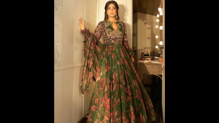 4. ⁠Emerald Green Floral Anarkali: Television diva Hina Khan stunned with a breathtaking appearance in a magnificent emerald green floral Anarkali. Perfect for the upcoming festival season, this ensemble is an ideal addition to your fashion gallery dedicated to celebrity ethnic style inspiration. The look, an epitome of grace and modern tradition, is instantly bookmark-worthy for anyone searching for a standout outfit. (Image Source: Instagram/@realhinakhan)