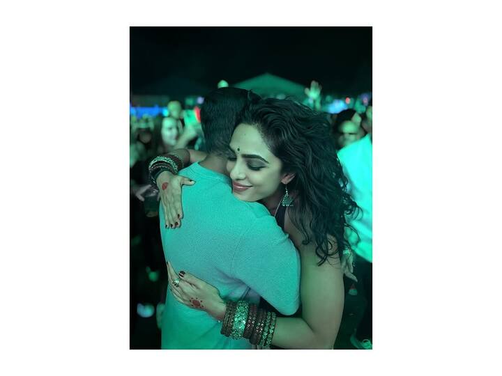 A picture hugging a loved one, whose face was hidden, sparked curiosity.