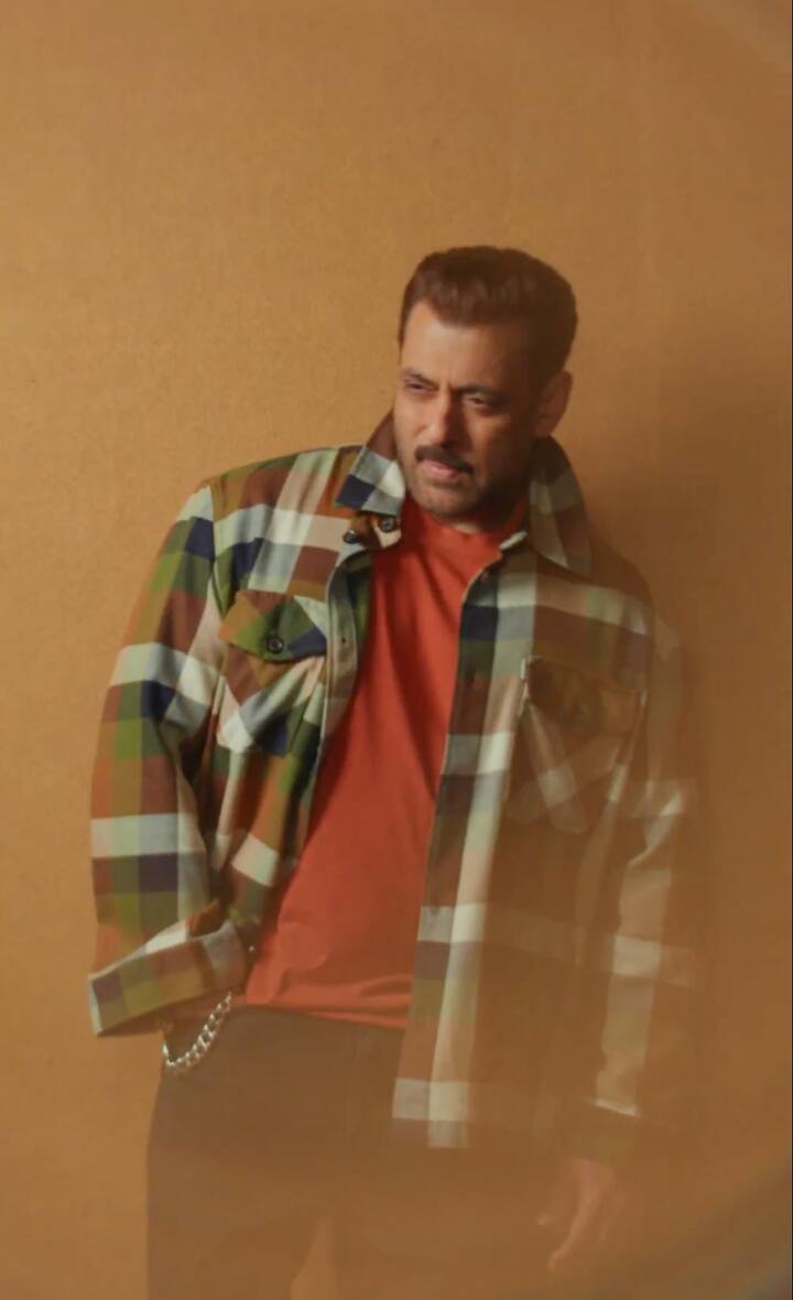 Apart from this, Salman is wearing an oversized shirt with a colorful check over the orange T-shirt in a picture. It is giving a little comfortable vibe.