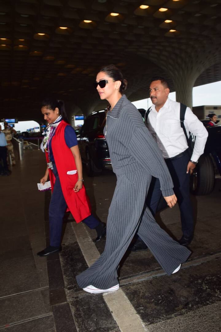 दीपिका के एयरपोर्ट लुक की बात करें तो एक्ट्रेस ने ज़िप-अप कॉलर वाली जैकेट और चौड़े पैरों वाली पिनस्ट्राइप ट्राउज़र वाला ग्रे को-ऑर्ड सेट कैरी किया हुआ था.