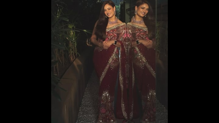 1. Dazzling Maroon Saree: Shweta Tiwari’s choice is a breath-taking maroon-coloured saree, the quintessential shade for Diwali night. The saree offers a look that is both deeply traditional and undeniably contemporary. The ensemble features a rich fabric providing a canvas for extraordinary, head-turning detail. The saree is generously embellished with meticulous sequin and thread work. It is an investment piece of traditional Indian ethnic wear that is set to dominate Diwali 2025 fashion trends. (Image Source: Instagram/@shweta.tiwari)
