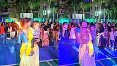 Pune's Woman Bartender Juggles Fire Bottles With Toddler In Arms — WATCH