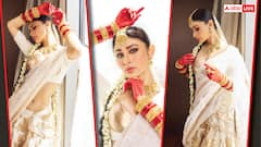 मौनी रॉय की 10 दिलकश तस्वीरें, हाथों में आल्ता लगा फ्लॉन्ट किया रॉयल लुक