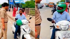 चालान कटना है कट जाए, गुटखा नहीं थूकूंगा... बिना हेलमेट पुलिस ने रोका, फिर भी मुंह में भरे रहा पीक; वीडियो वायरल