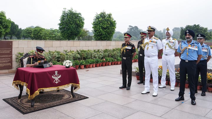 Chief of Defence Staff (CDS) General Anil Chauhan signs the visitor's book at the National War Memorial after paying tribute on the 93rd Indian Air Force Day, in New Delhi, Wednesday, Oct. 8, 2025. Chief of the Army Staff (COAS) General Upendra Dwivedi, Chief of the Naval Staff (CNS) Admiral Dinesh K. Tripathi and Chief of the Air Staff (CAF) Air Chief Marshal A. P. Singh also seen. (Image Source: PTI Images)