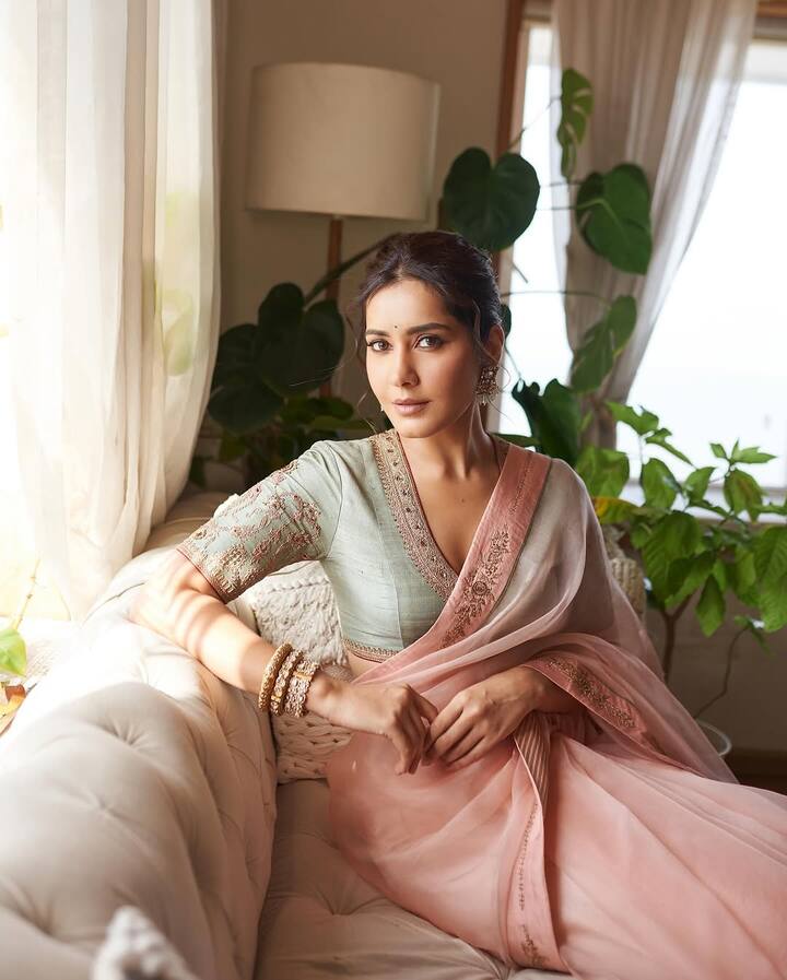 If you are fond of pastel colors then pair this peach colored saree with pistachio colored blouse. This type of plain simple saree will look great with heavy embroidered blouse.