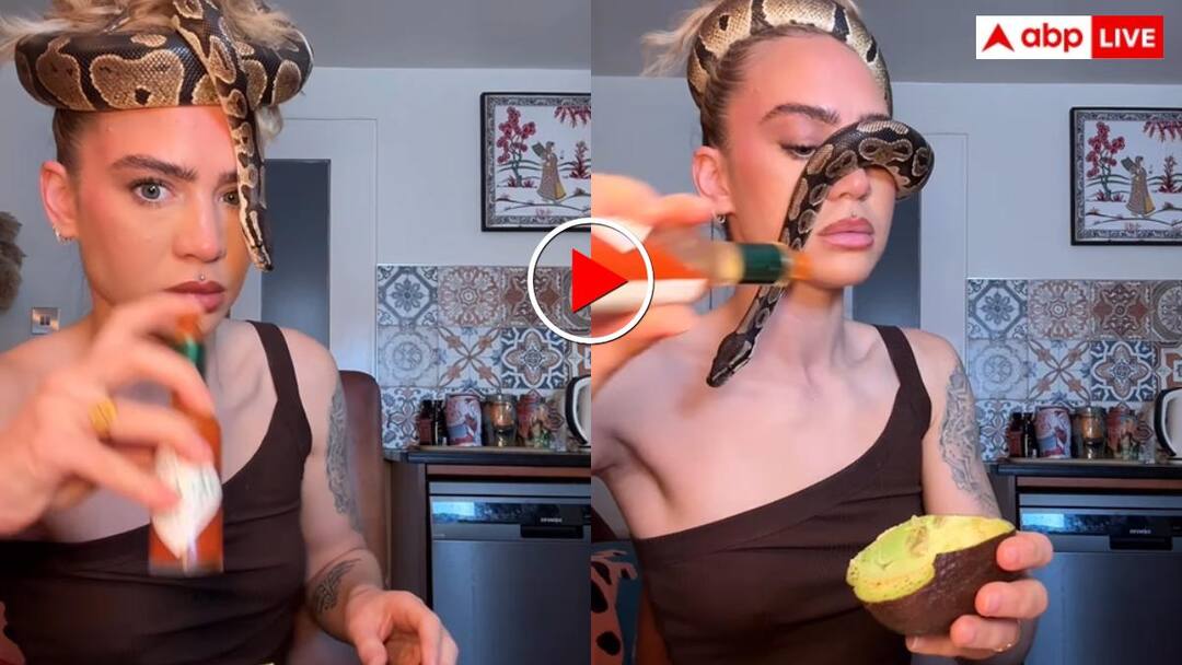 Woman wrapped the python around her head and then started doing it video goes viral महिला ने सिर पर लपेटा सांप और लगी खाना खाने! लोग बोले दरिंदा है निगल जाएगा- वीडियो वायरल