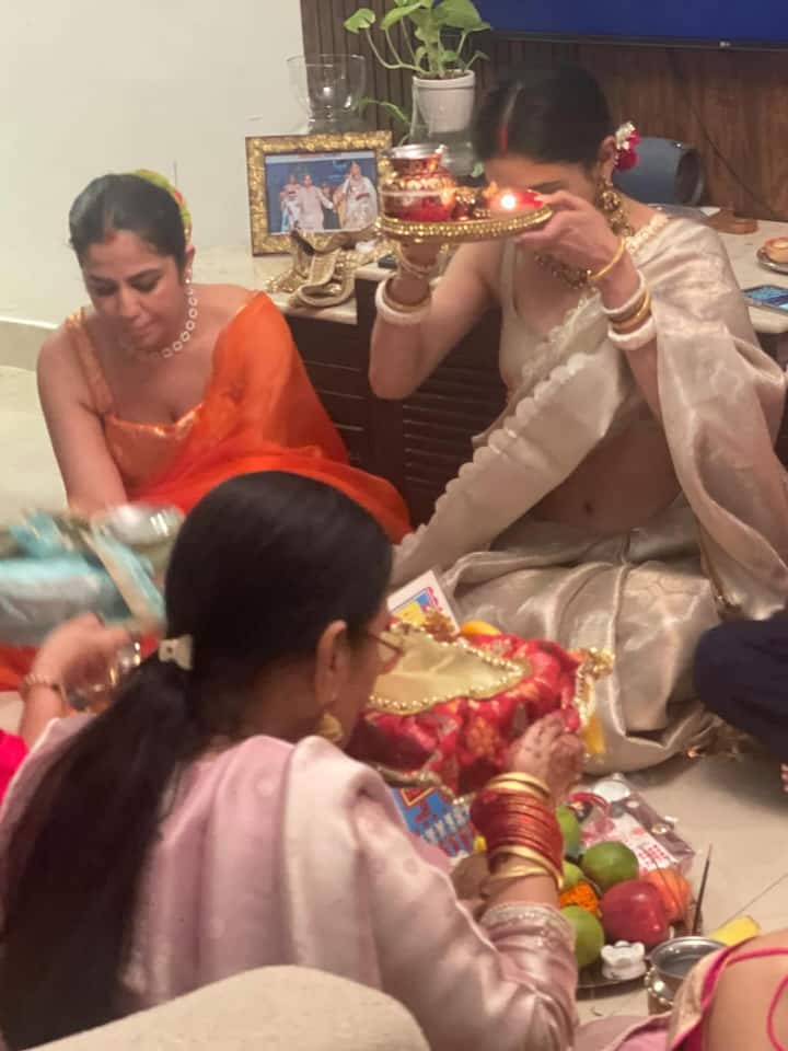 In this picture, Mouni is seen worshiping Karva Chauth. Mouni was looking very beautiful in traditional look during the puja.