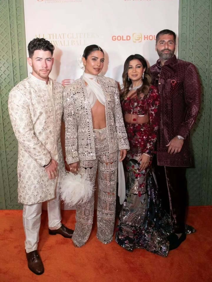 Nick Jonas complemented her in a white sherwani embellished with intricate mirror work.