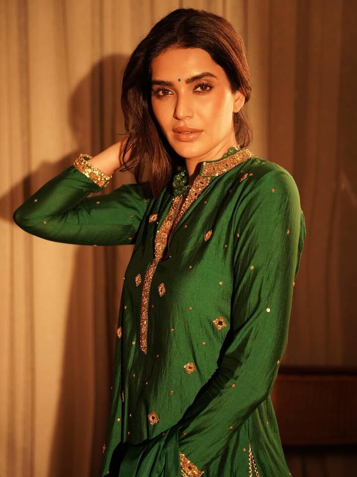 Known for her impeccable fashion sense, Karishma Tanna effortlessly blends traditional Indian wear with modern aesthetics, making her festive looks stand out.