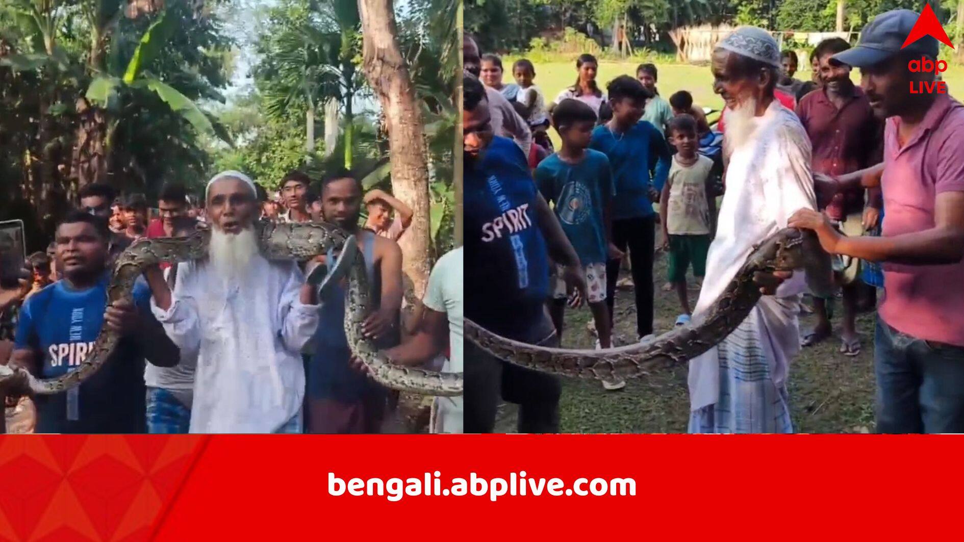 Jalpaiguri News: বন্যার জলে ভেসে আসা অজগর নিয়ে ছেলেখেলা, সেলফি তোলার হিড়িক জলপাইগুড়িতে, শিকেয় উঠল নিয়ম-কানুন