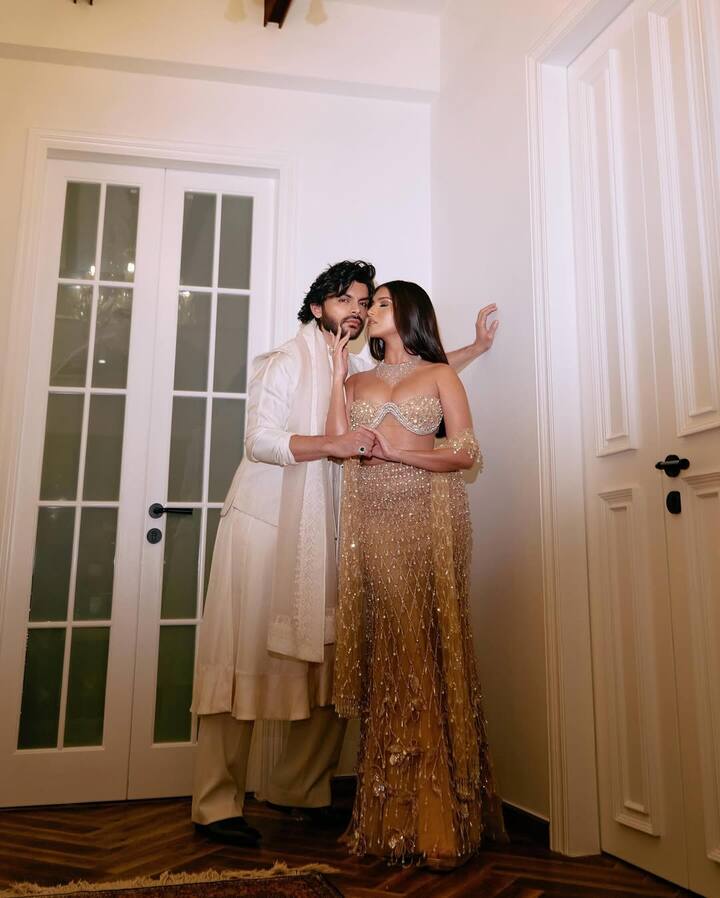 In another picture, while Veer is looking towards the camera, Tara is seen closing her eyes and feeling the moment.