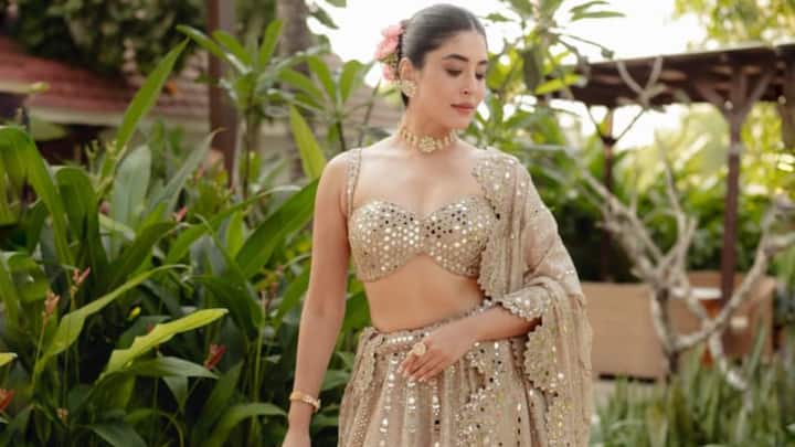 Champagne Lehenga With Mirror Embellishment: Kritika Kamra looks absolutely stunning in this festive fashion choice, which features a beautiful beige or champagne-coloured lehenga set richly adorned with mirror work and intricate embroidery across the voluminous skirt and fitted, sweetheart-neckline choli (blouse). She completes the look with a matching sheer dupatta draped over one shoulder and minimal yet striking gold jewellery, including a choker and bangles. (Image Source: Special Arrangement)