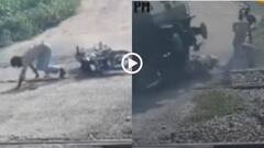 Video: मौत के 6 सेकंड! फाटक पर फिसली युवक की बाइक, उठाते वक्त ट्रेन ने कुचला, नोएडा का वीडियो वायरल