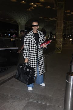 करण जोहरचा ब्लॅक अँड व्हाइट कोटमधला सुपर स्टायलिश लूक सोशल मीडियावर व्हायरल!