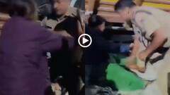 Video: घर में घुसा दिया ट्रक, मुआवजे पर विवाद के बाद ट्रक में आग लगाने लगी महिला, बवाल का वीडियो वायरल