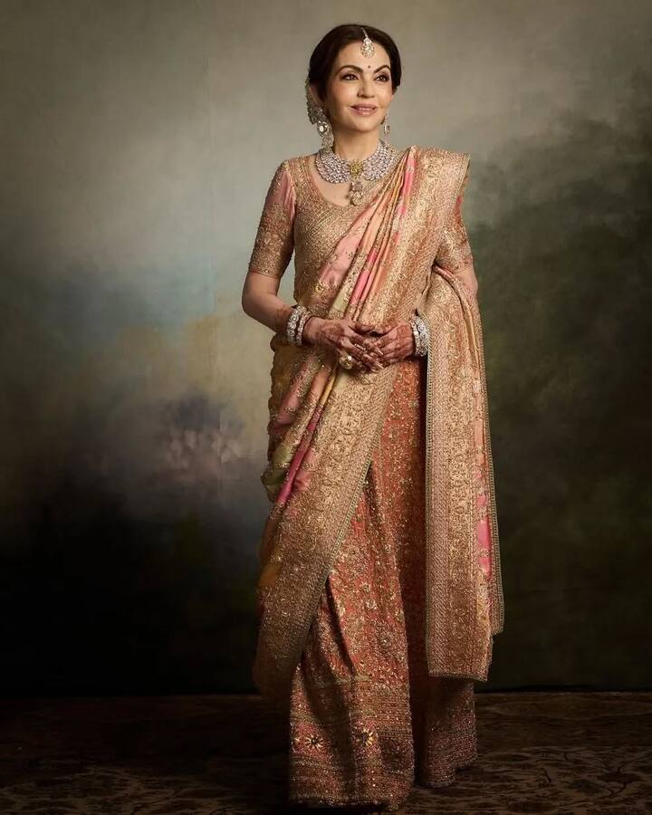 Like Nita Ambani, you can drape a heavy saree with a three-quarter blouse with heavy work.