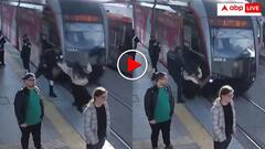 फोन में मशगूल थी महिला, सड़क पर चलते हुए सामने से आई ट्रेन, फिर ऐसे बची जान- डरा देगा वीडियो