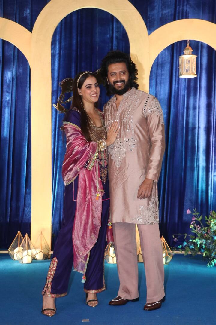 Genelia D'Souza and Riteish Deshmukh's royal look was seen at Nikhil Advani's Diwali party. Both of them posed for the paps while blushing.