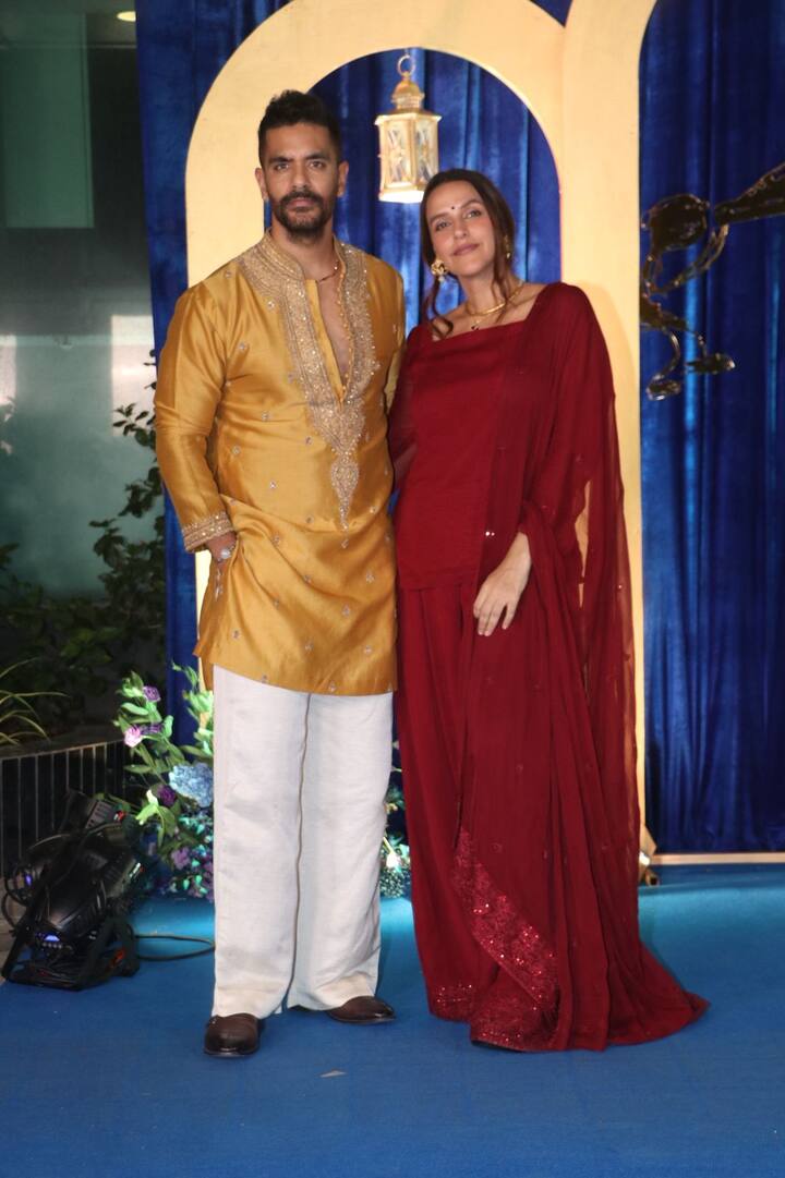Actress Neha Dhupia attended this party with husband Angad Bedi. Both were seen posing in traditional look.