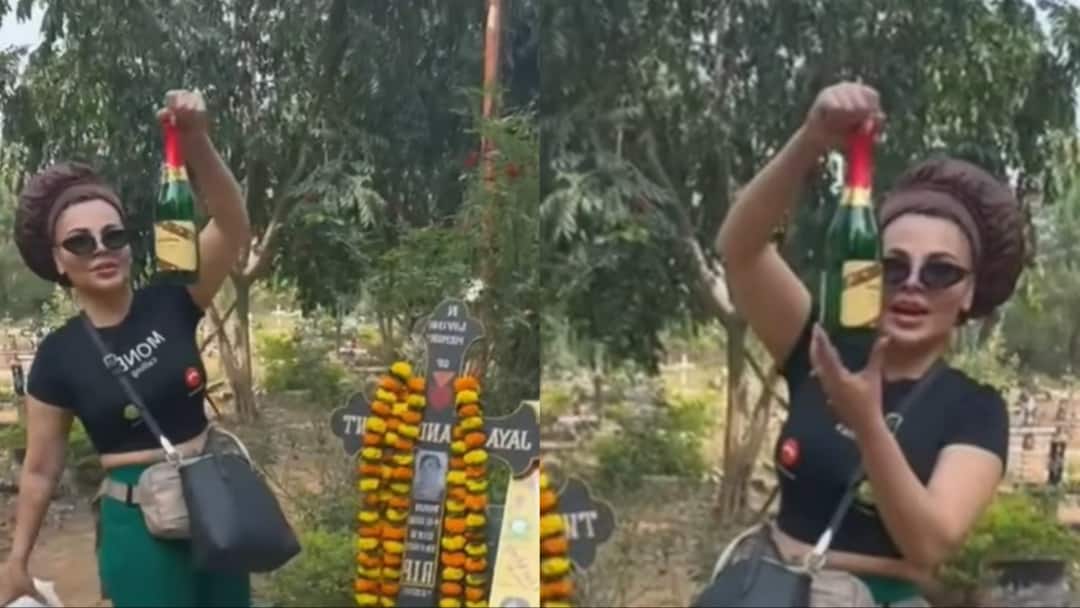 मां की कब्र पर शैंपेन की बोतल लेकर पहुंचीं राखी सावंत, भड़के यूजर्स, बोले - 'दिखावा क्वीन..’
