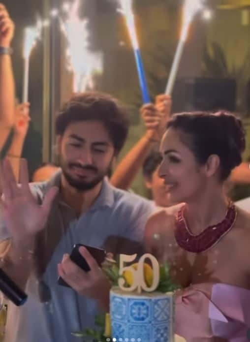 A grand party was thrown for Malaika Arora by her son Arhaan Khan and family. In which there was also a special cake of two layer cake.