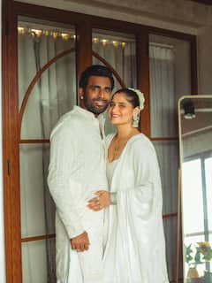 Arti Singh & Dipak Chauhan Celebrate 1.5 Years In Dreamy All-White Photoshoot