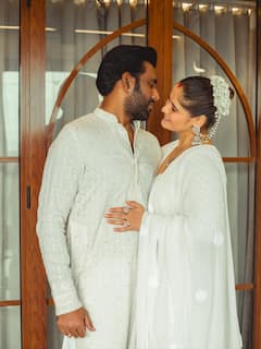 Arti Singh & Dipak Chauhan Celebrate 1.5 Years In Dreamy All-White Photoshoot