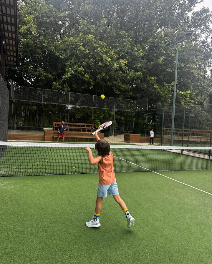 In one of these pictures, Taimur was seen playing badminton. His face is not visible in the photos.