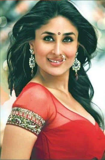 Kareena Kapoor Khan: In Ra.One’s iconic track Chammak Challo, Kareena redefined screen presence in a red saree with a netted blouse, exuding unmatched grace and infectious energy.