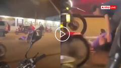 Video: गाड़ी पर खड़े होकर कर रहे थे डांस, धड़ाम से नीचे गिरे दो लोग, उठ भी नहीं पाए, वीडियो वायरल