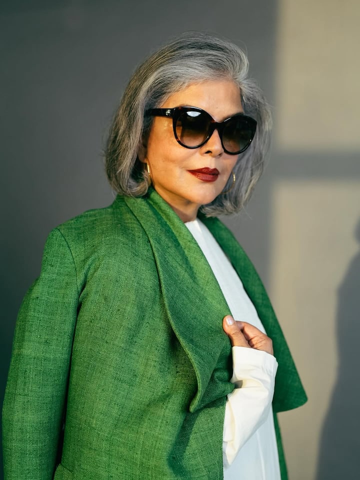 Zeenat Aman, real name Zeenat Amanullah Khan, is an Indian actress and model. She worked mainly in Hindi films and is considered one of the most glamorous actresses of the 1970-80s. During her career, she has been among the highest-paid actresses and has also received one award out of three Filmfare nominations.