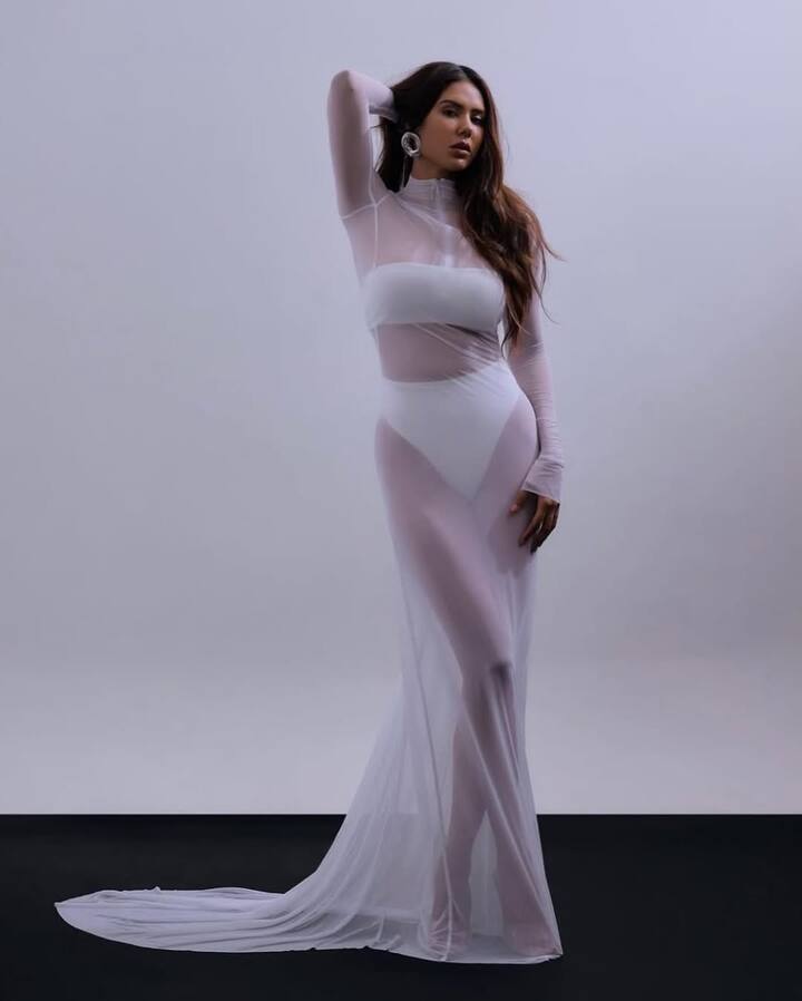 Sonam Bajwa can be seen wearing a white transparent dress in the latest photos. She has carried it with matching innerwear.