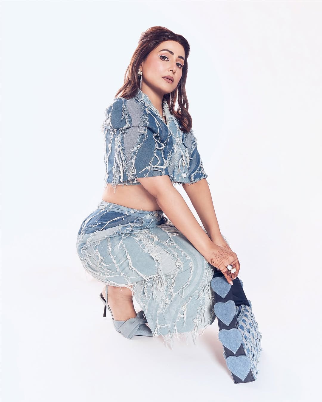 Overall, this picture is a great example of Hina Khan's glamorous personality and fashion sense.