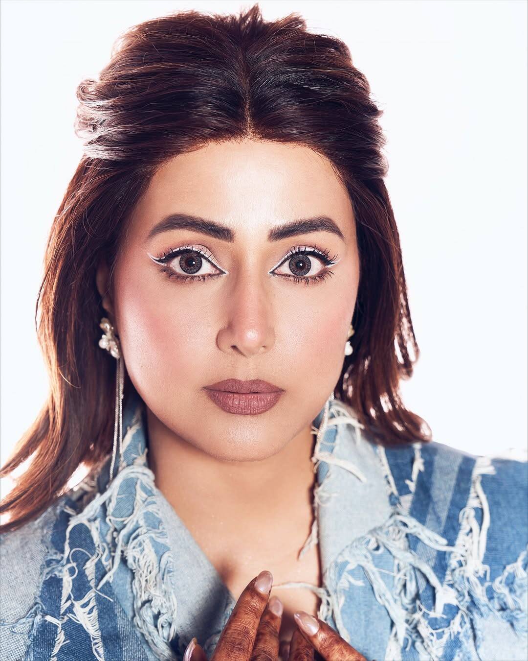 Hina Khan's posing in this photo is quite confident and strong.