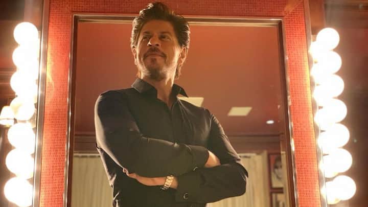 Simple yet striking, Shah Rukh stuns in a fitted black shirt and trousers under glowing mirror lights. The clean tailoring, minimal accessories, and quiet confidence make this an example of effortless sophistication. (Image Source: Instagram/ iamsrk)
