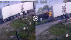 Video: ट्रेक पर फंस गया लंबा-चौड़ा ट्रक, ट्रेन ने मारी जोरदार टक्कर, उड़ गए परखच्चे, देखें वीडियो