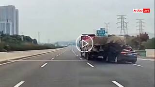 Video: हाइवे पर 22 टायर वाले ट्रक में घुसी कार, सामान में अटकी छत, कई मीटर तक घिसटती गई, देखें वीडियो